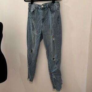 Guess high rise cropped distressed denim blue jeans. Size 30.